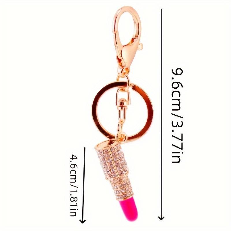 Rožinis lūpdažis raktų pakabukas